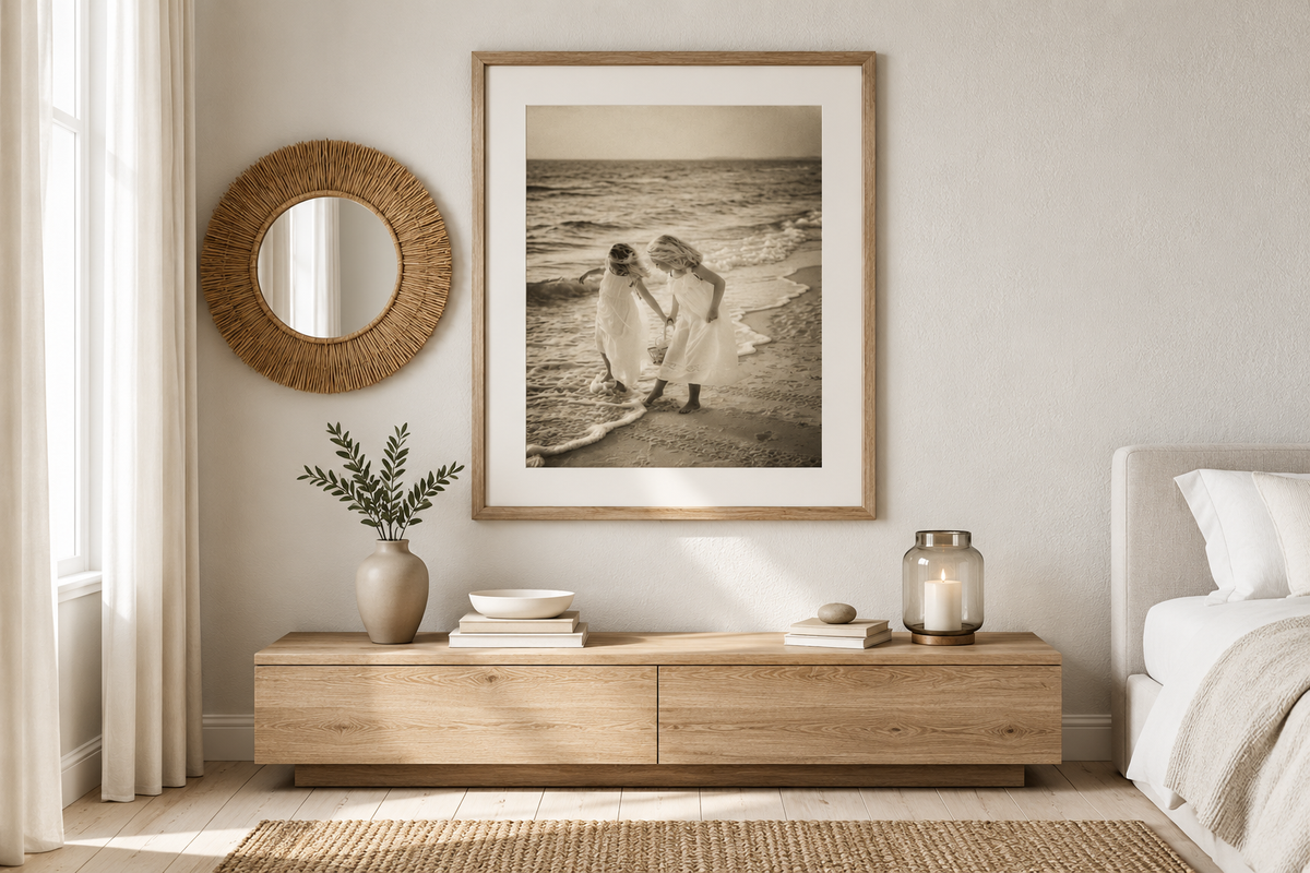 Best Friends Collecting Shells fine art print displayed framed in a living room